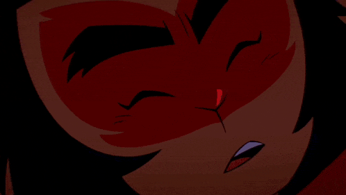 a close up of a cartoon character 's face with a glowing cross in the middle of it .