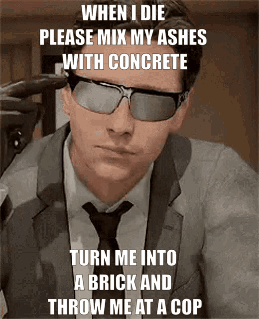 a man in a suit and tie wearing sunglasses with a caption that says when i die