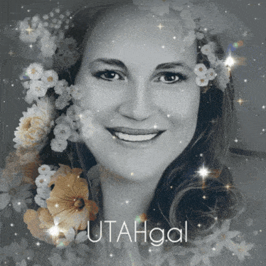 a black and white photo of a woman with flowers in her hair and the name utahgal