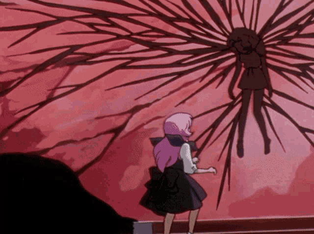 a girl with pink hair is standing in front of a shadow of another girl