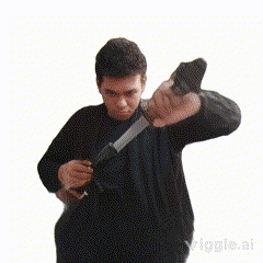 a man in a black shirt is holding a gun and a knife in his right hand
