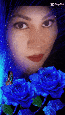 a woman 's face is surrounded by blue roses and a butterfly with the caption capcut