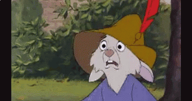 a cartoon rabbit wearing a hat with a red feather is standing next to a tree .
