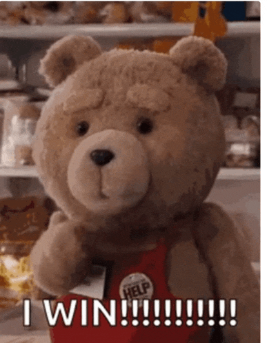 a teddy bear is wearing a red apron that says help on it