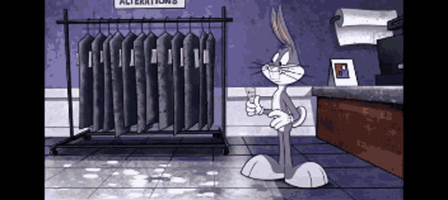 bugs bunny giving a thumbs up in front of a rack of clothes