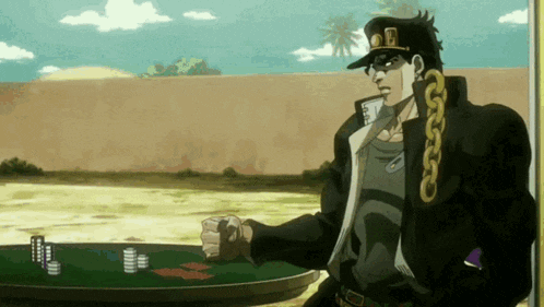 a man in a black jacket and hat is standing in front of a table with poker chips on it