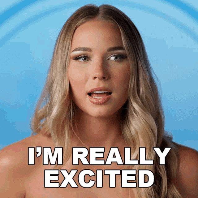 a woman says i 'm really excited in front of her face