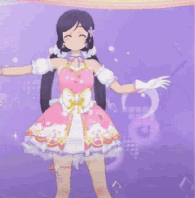 a girl in a pink dress with a bow on the front