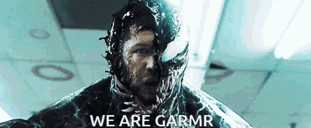 a close up of a man with venom on his face and the words we are garmr below him
