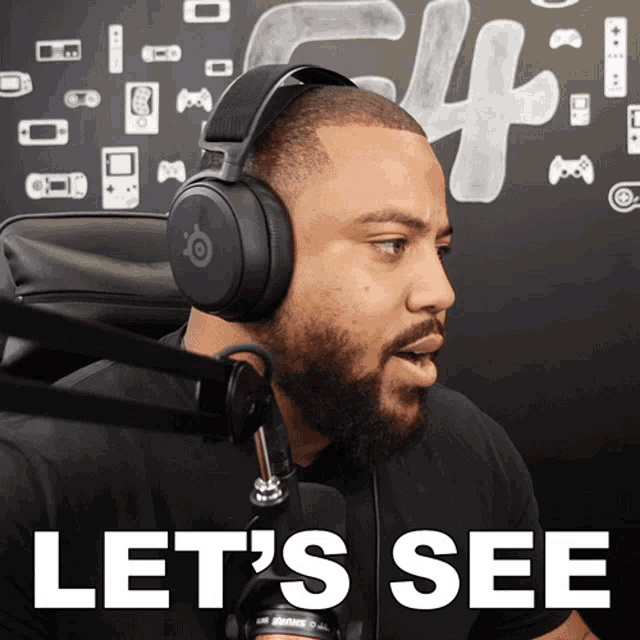 a man wearing headphones says let 's see in front of a microphone