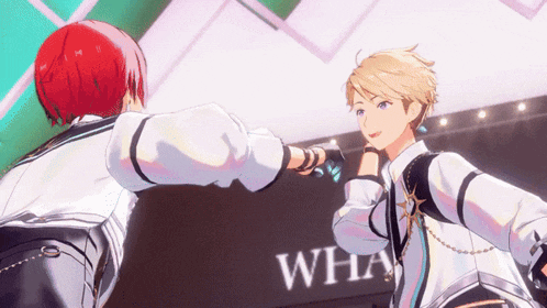 two anime characters are standing next to each other in front of a wall that says wha