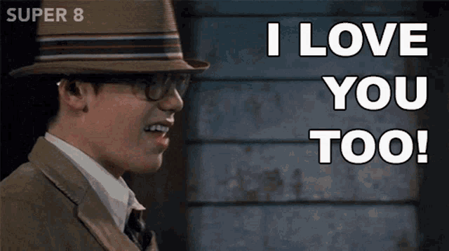 a man with glasses and a hat says i love you too