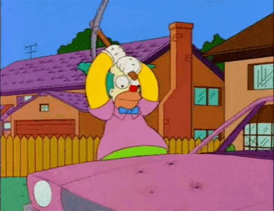 a cartoon of homer simpson holding a hammer in front of a house