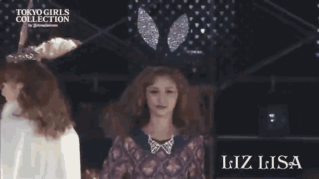a woman is walking down the runway at a tokyo girls collection
