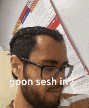 a man with braided hair and glasses says goon sesh in 5 on his face