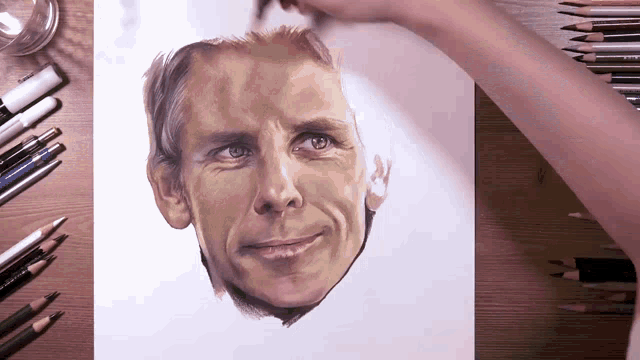 a drawing of a man 's face with colored pencils