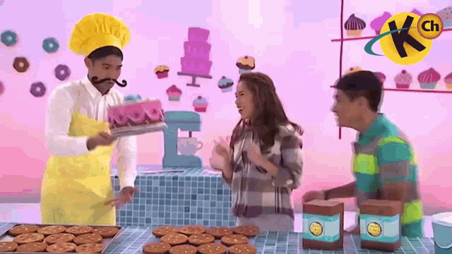 a man with a mustache is holding a tray of cookies