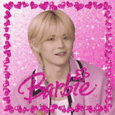 a picture of a boy with a pink barbie logo in the background