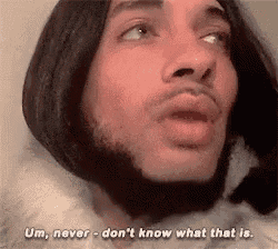 a man with long hair and a beard is saying um , never don 't know what that is .