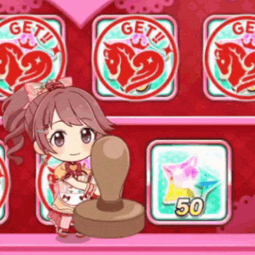a girl is holding a stamp in front of a wall that says get !