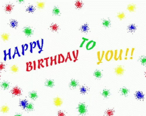 a green yellow and blue balloon with the words happy written on it
