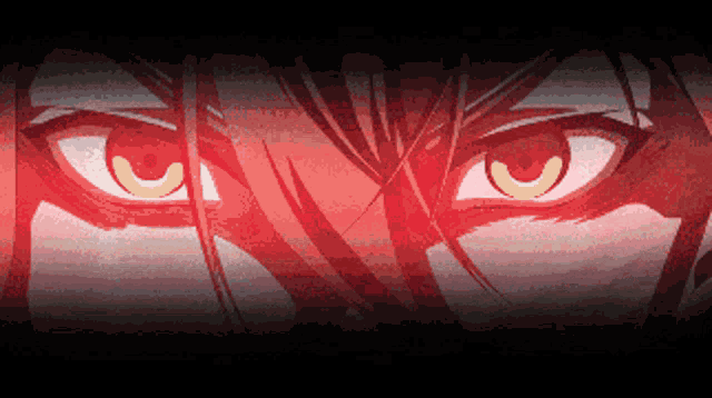 a close up of a person 's eyes with a red background
