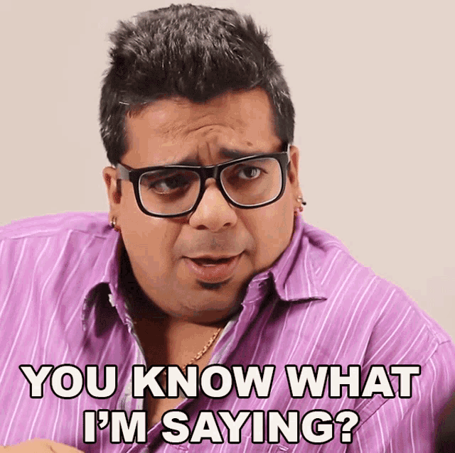 a man with glasses and a purple shirt says you know what i 'm saying