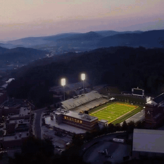 an aerial view of a stadium with the letter a on the top