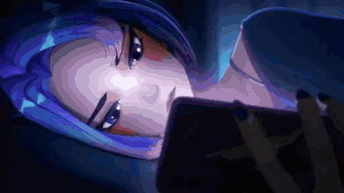 a close up of a woman looking at a cell phone
