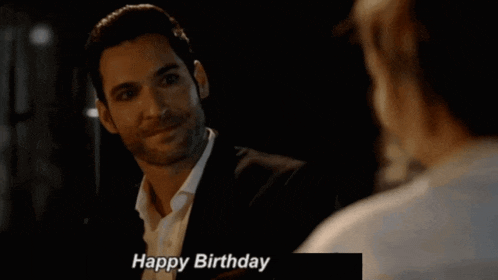a man in a suit says happy birthday