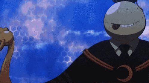 a cartoon character with his tongue hanging out and a crescent moon on his chest