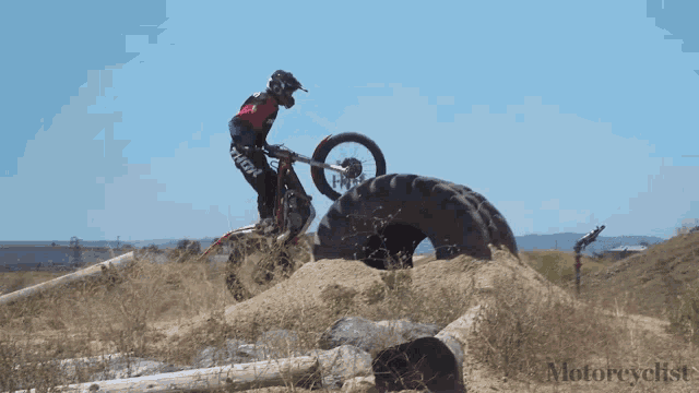 a person on a dirt bike with the word thor on their shorts