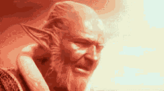 a statue of a man with a beard and ears