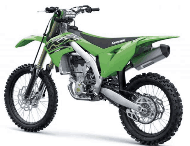 a green kawasaki dirt bike is sitting on a white background