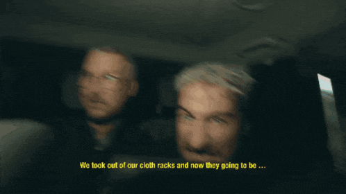 a man in the back seat of a car says " we look out of our cloth racks and now they going to be "