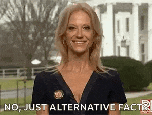 a woman is smiling while standing in front of a white house and saying `` no , just alternative facts '' .
