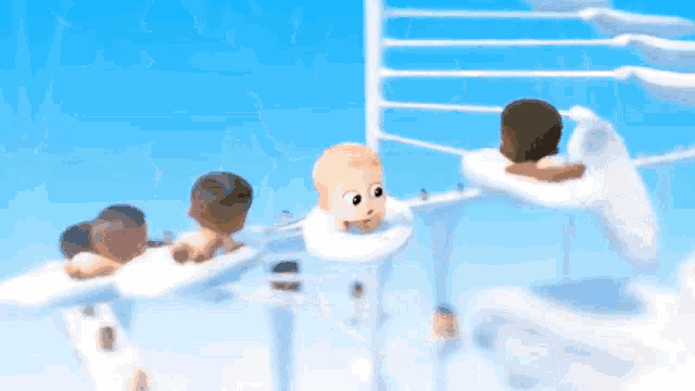 a group of babies are swimming in a pool