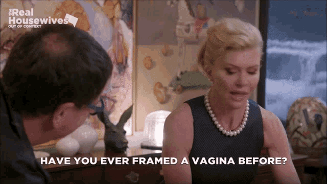 a woman talking to a man on real housewives