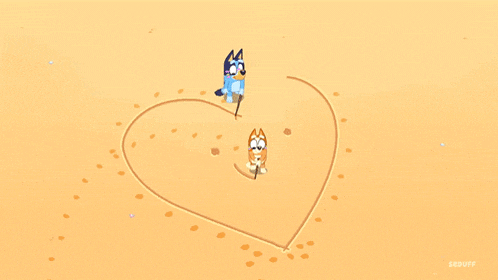 two cartoon characters are drawing a heart in the sand ..