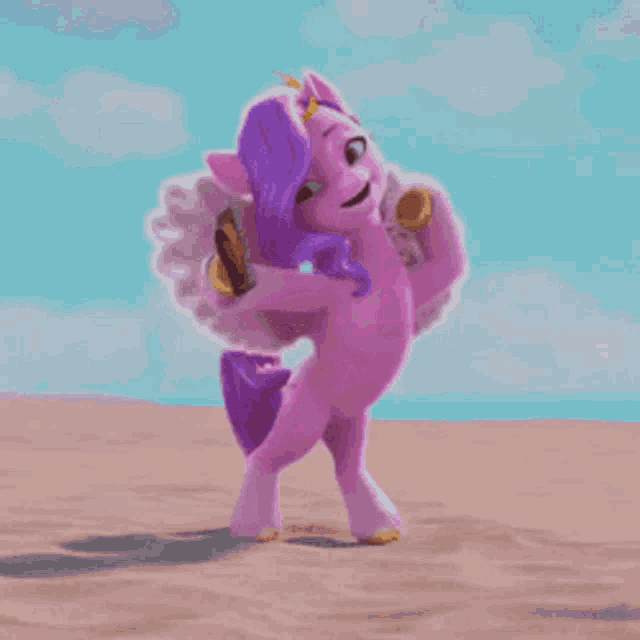 a purple pony is standing on a sandy beach holding a pearl .
