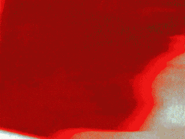 a blurred image of a person 's face on a brown background