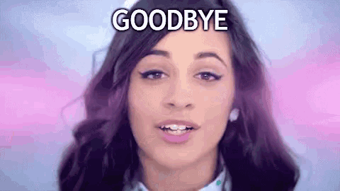 a woman is saying goodbye with her mouth open .