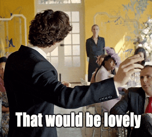 a man in a suit is taking a selfie and the caption says that would be lovely