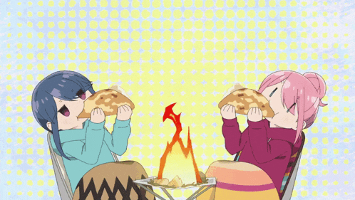 a couple of anime girls eating food in front of a fire