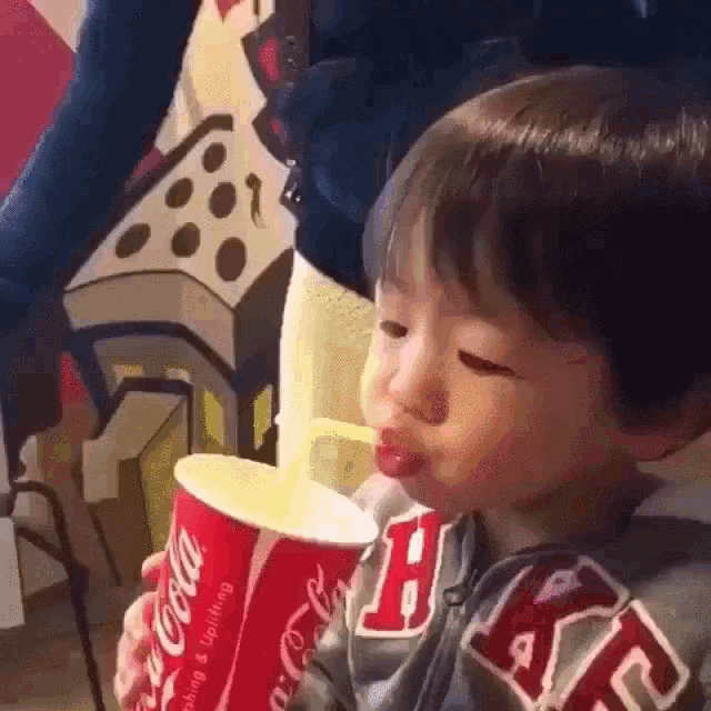 Kid Drinks GIF - Kid Drinks Coca Cola GIFs