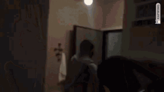 a blurry picture of a person 's face with the word mustang on the bottom right corner