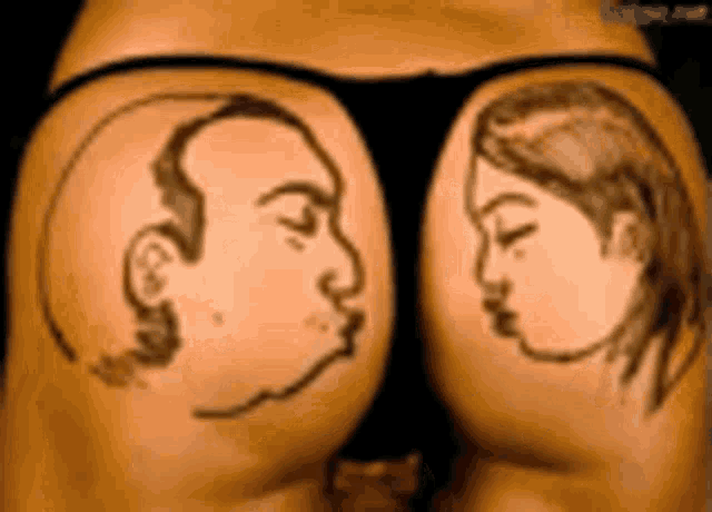 a woman has two drawings of a man and a woman on her butt