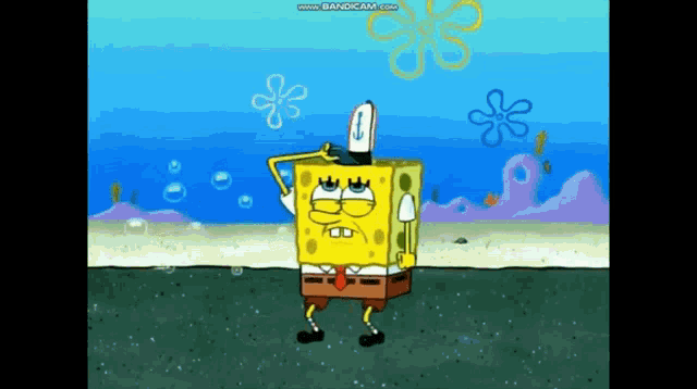 a cartoon of spongebob squarepants standing on the beach
