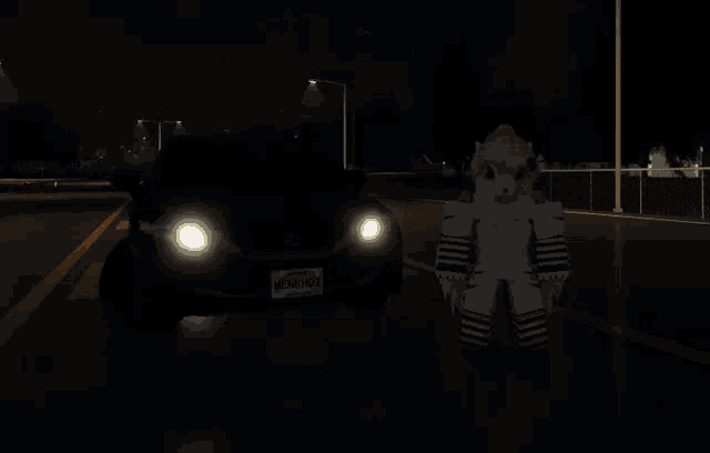 a car with a license plate that says mennhot is parked in a dark parking lot