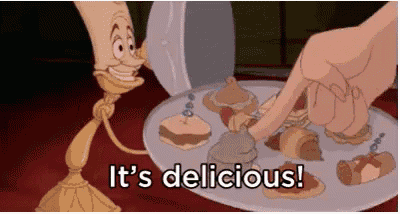 a cartoon character from beauty and the beast is holding a tray of desserts and saying it 's delicious .